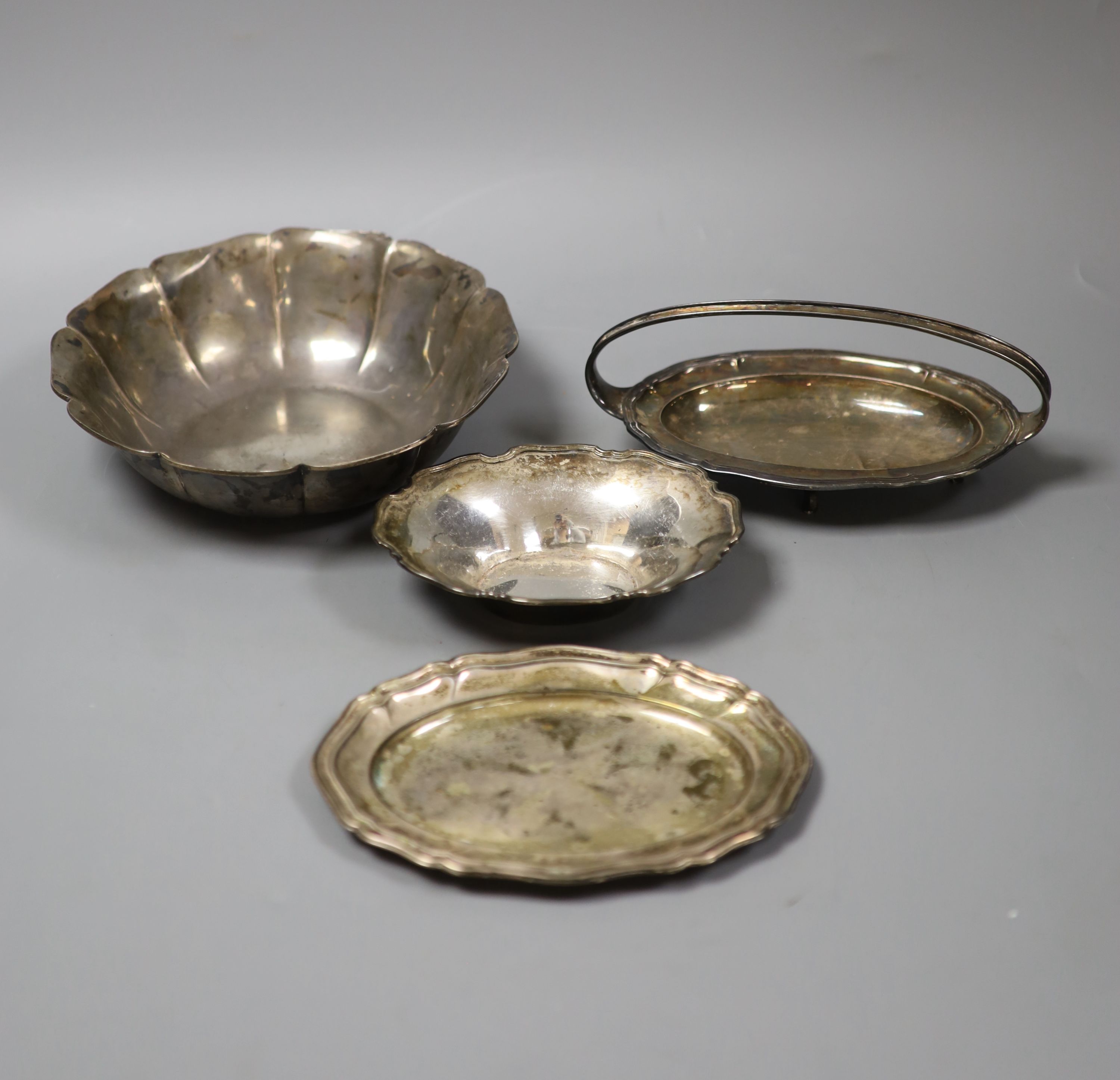 A sterling bowl, two sterling dishes and one other dish